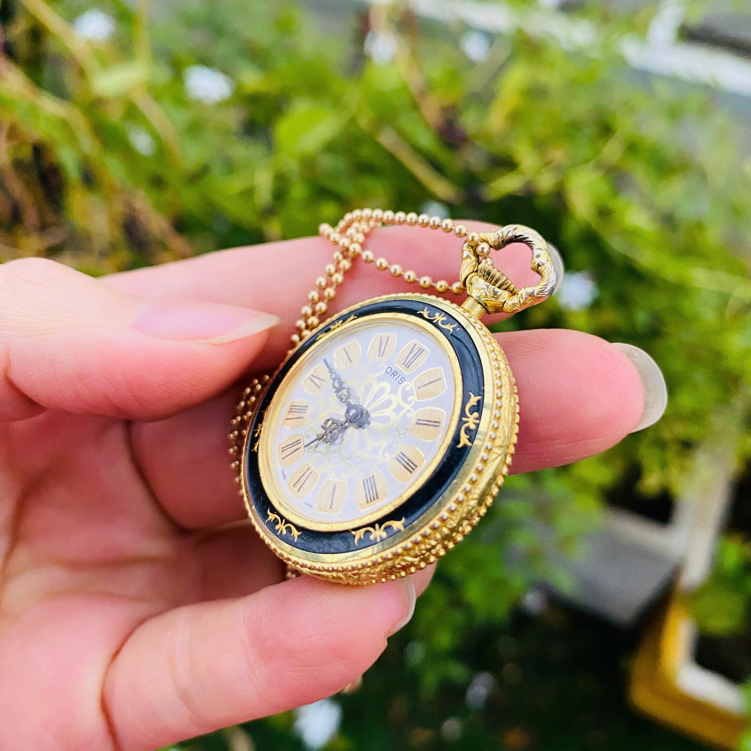 Đồng hồ quả quýt Oris Thụy Sĩ cót tay