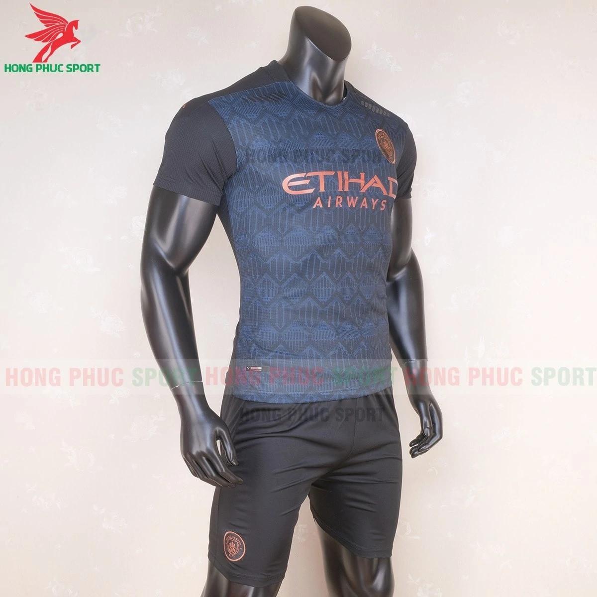 Áo đáu Manchester City sân khách(phải)