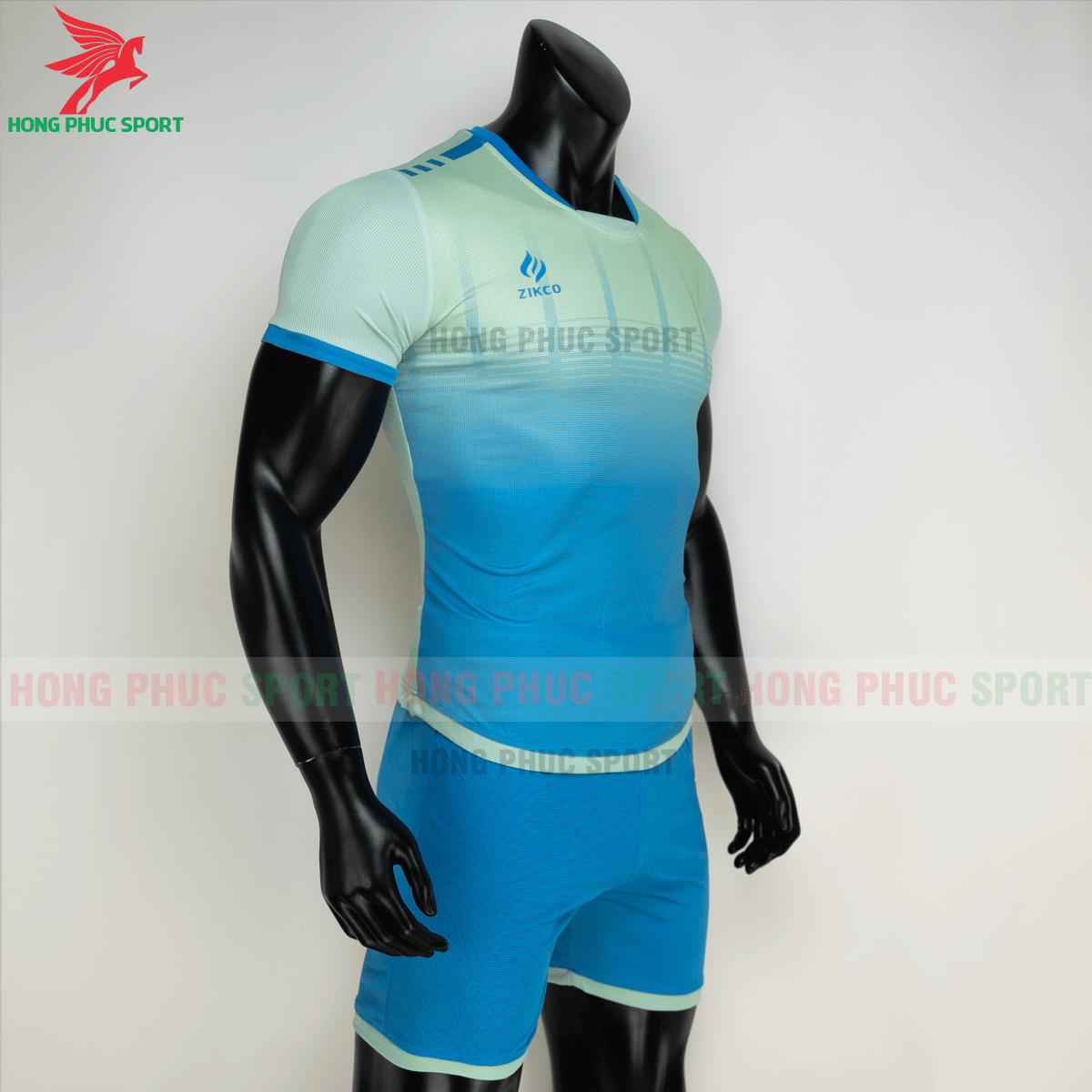 Áo đá banh không logo ZIKCO Z01 2021 màu Xanh ngọc (phải)