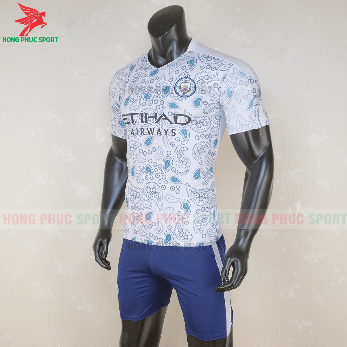 Áo đấu Manchester City 2020 mẫu thứ 3 (trái))