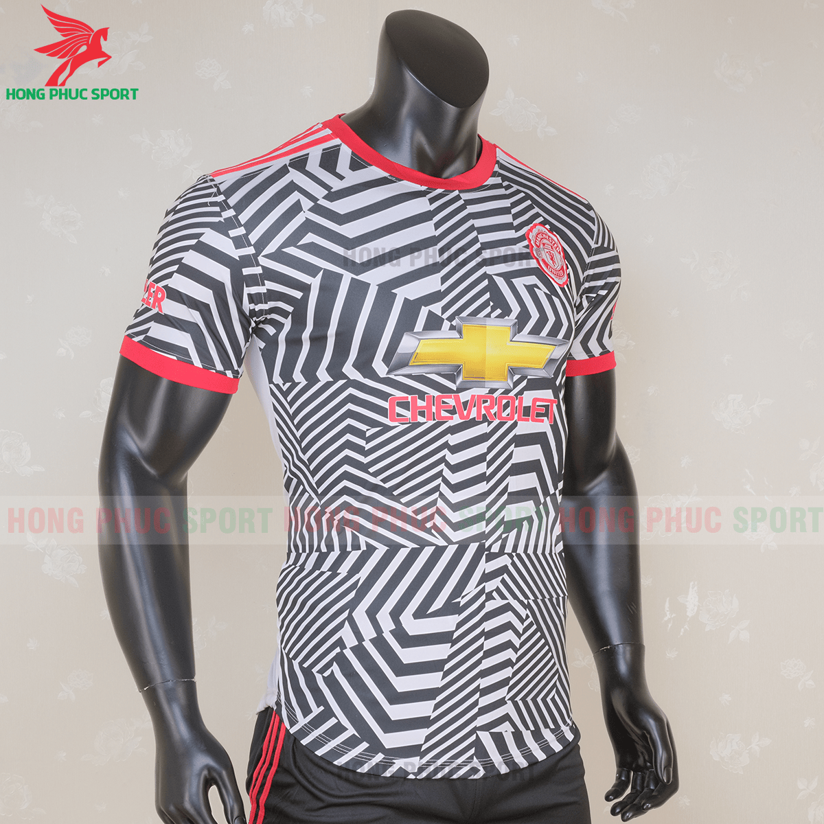 Áo đấu Manchester United mẫu thứ 3 (phải)