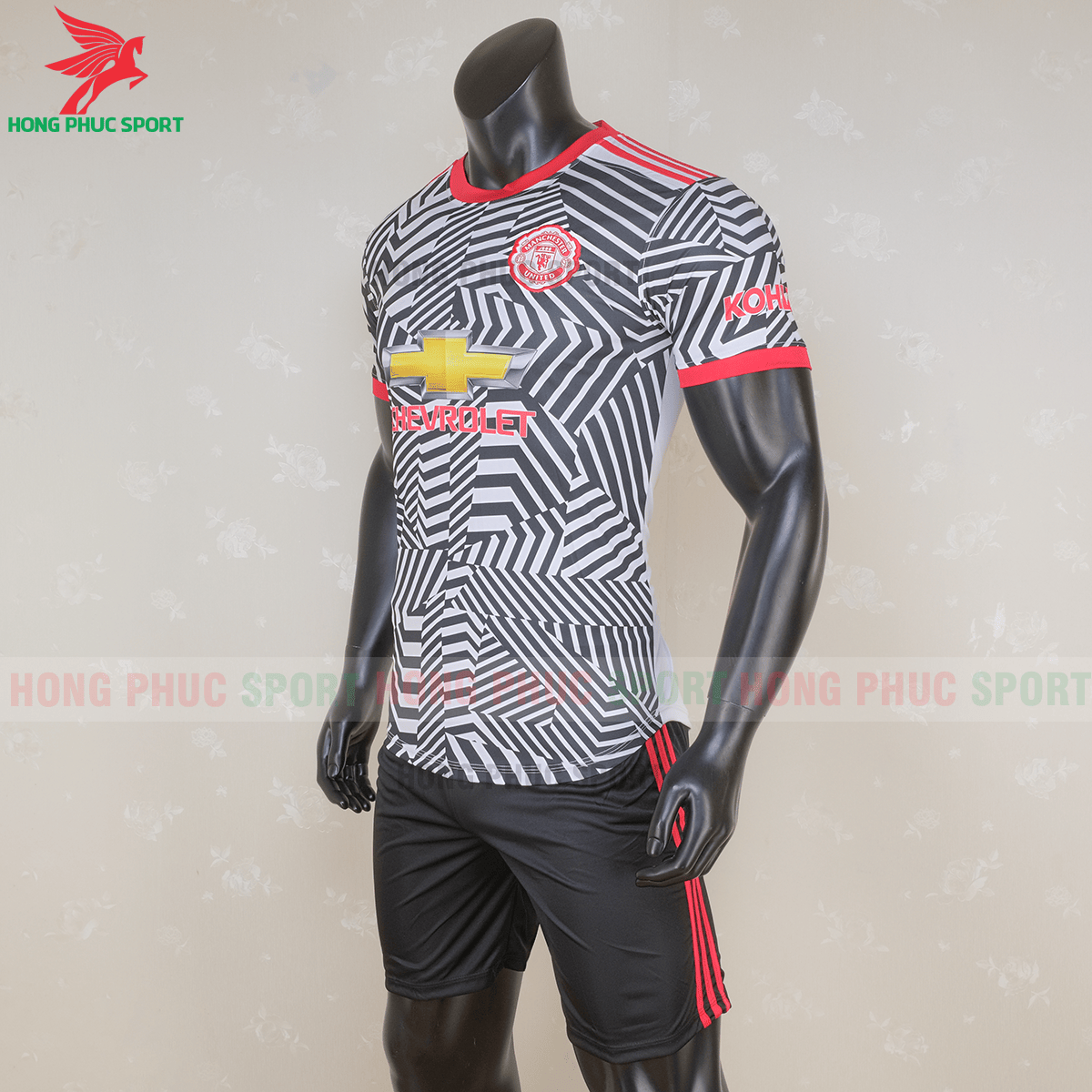 Áo đấu Manchester United mẫu thứ 3 (trái)