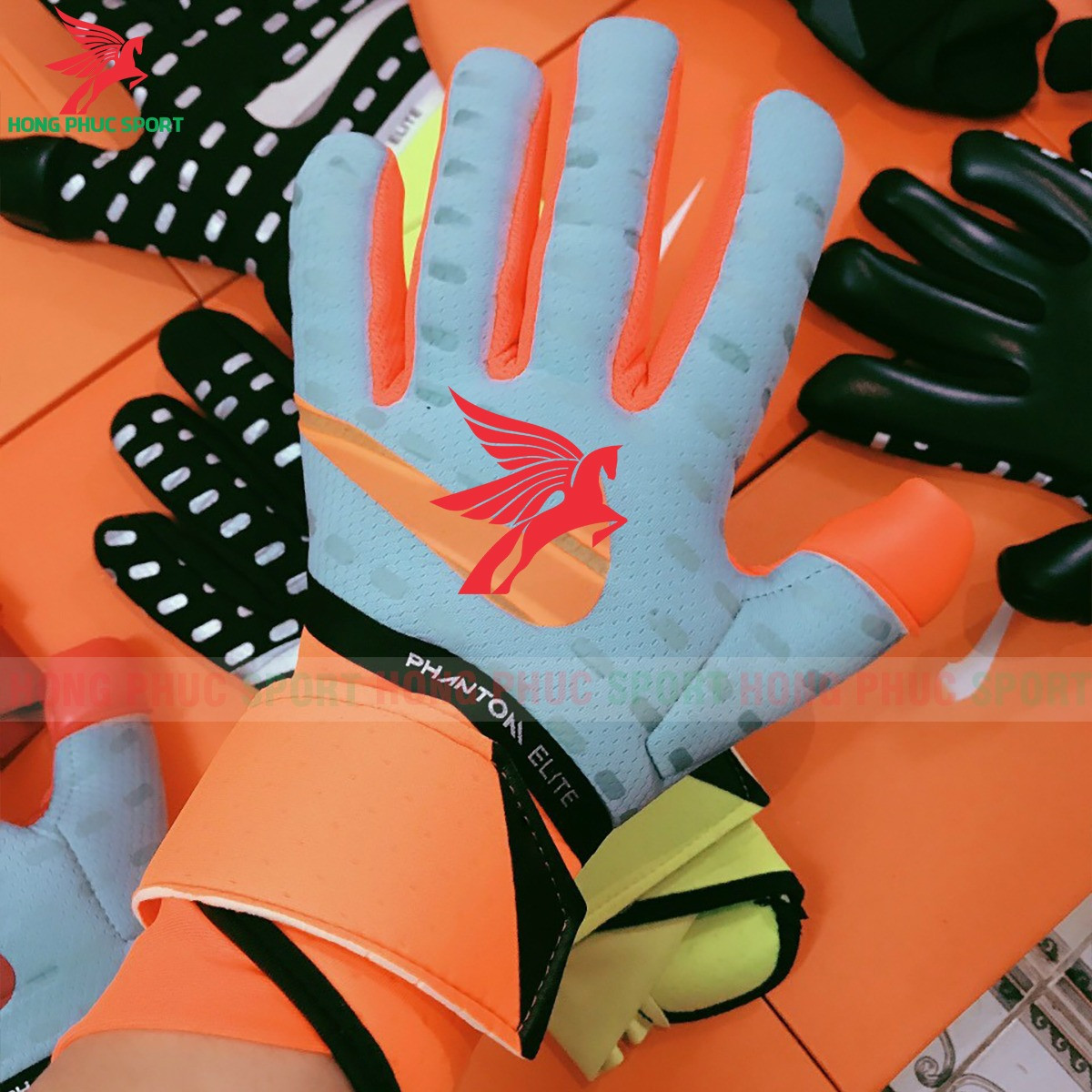 Găng tay thủ môn NIKE không xương màu xanh - đai quấn cam